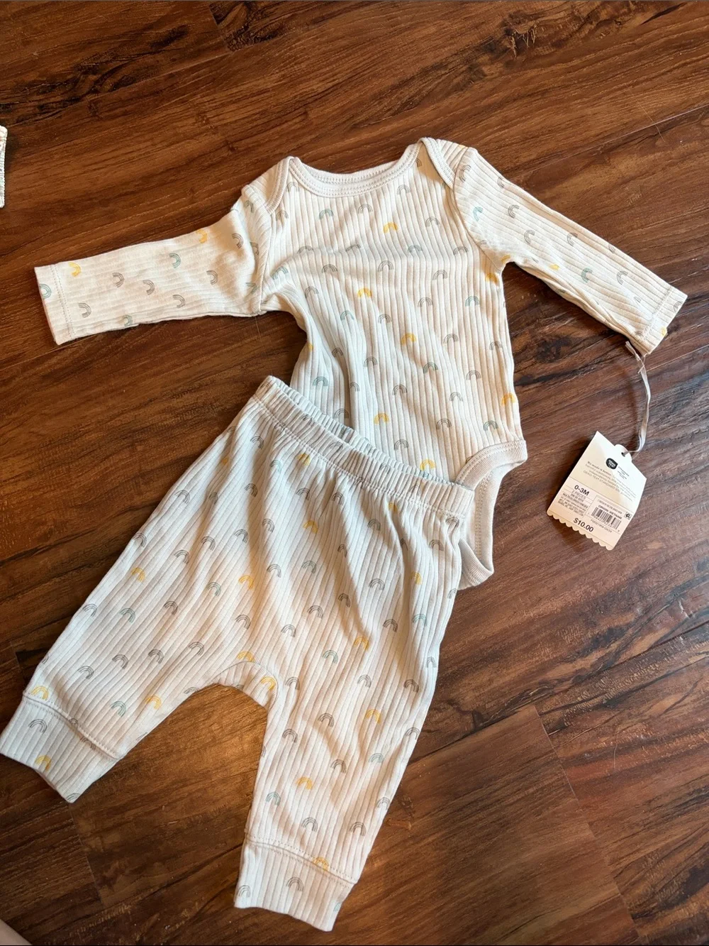 Target Ivory Ribbed Kids Pajama Set with Yellow and Light Blue Rainbows